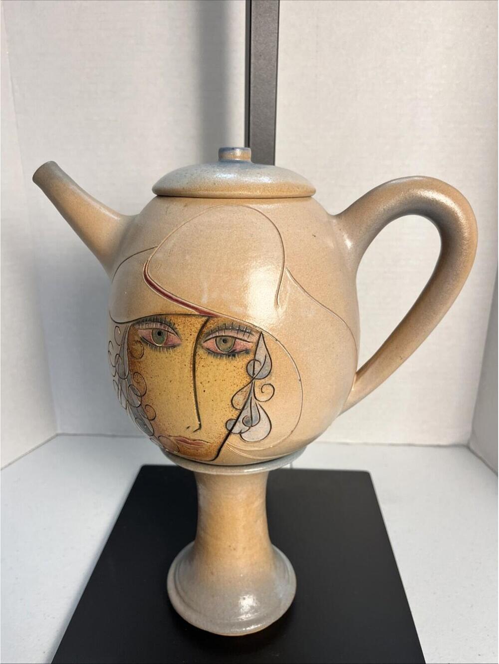 Teapot On A Pedestal With Women’s Face Pottery Decorative